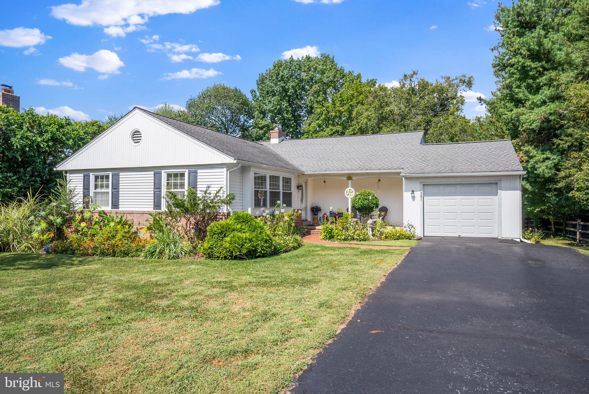 391 Rittenhouse Boulevard Eagleville, PA 19403 - Photo 1 of 43 a front view of a house with garden