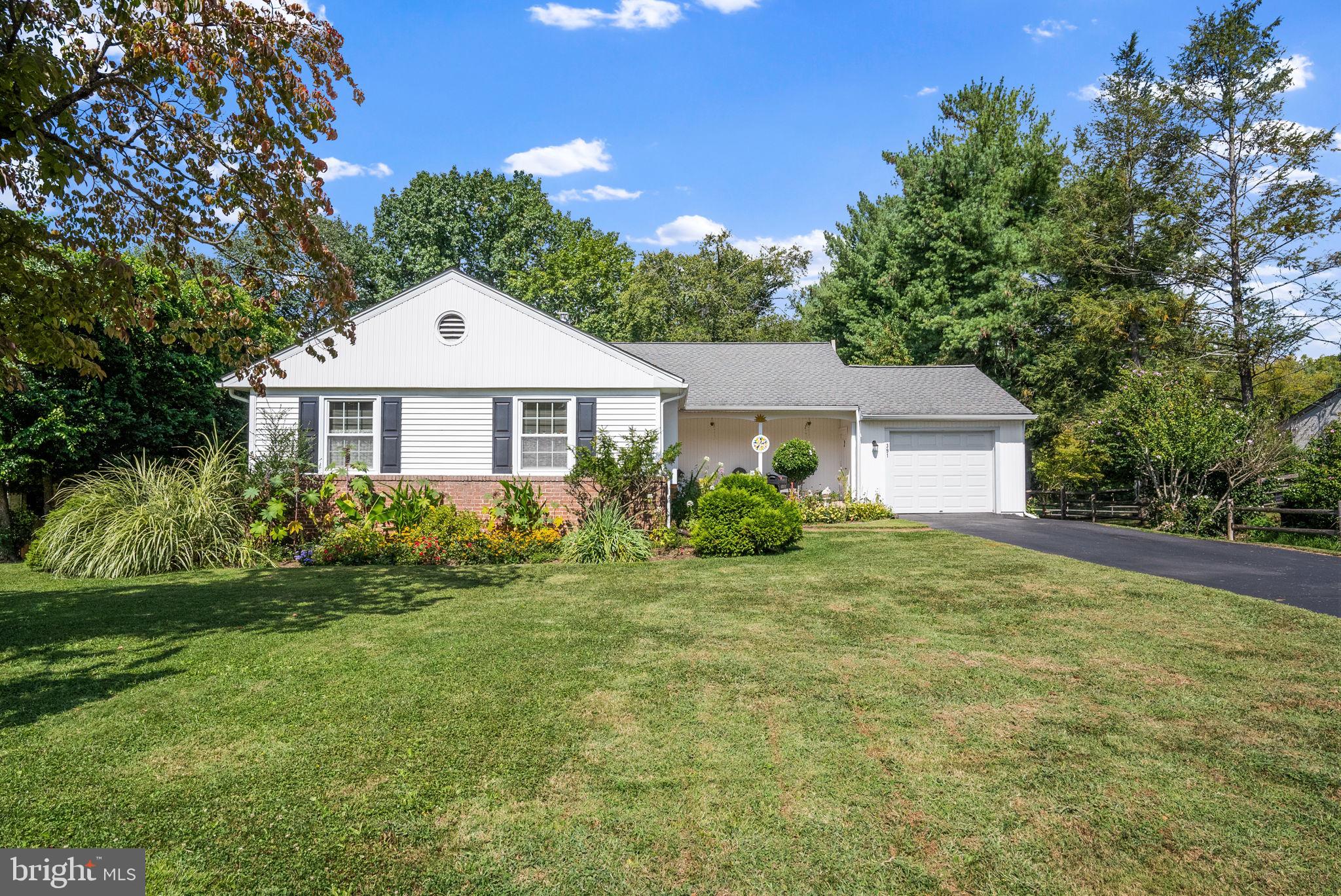 391 Rittenhouse Boulevard Eagleville, PA 19403 - Photo 3 of 43 a front view of a house with a yard