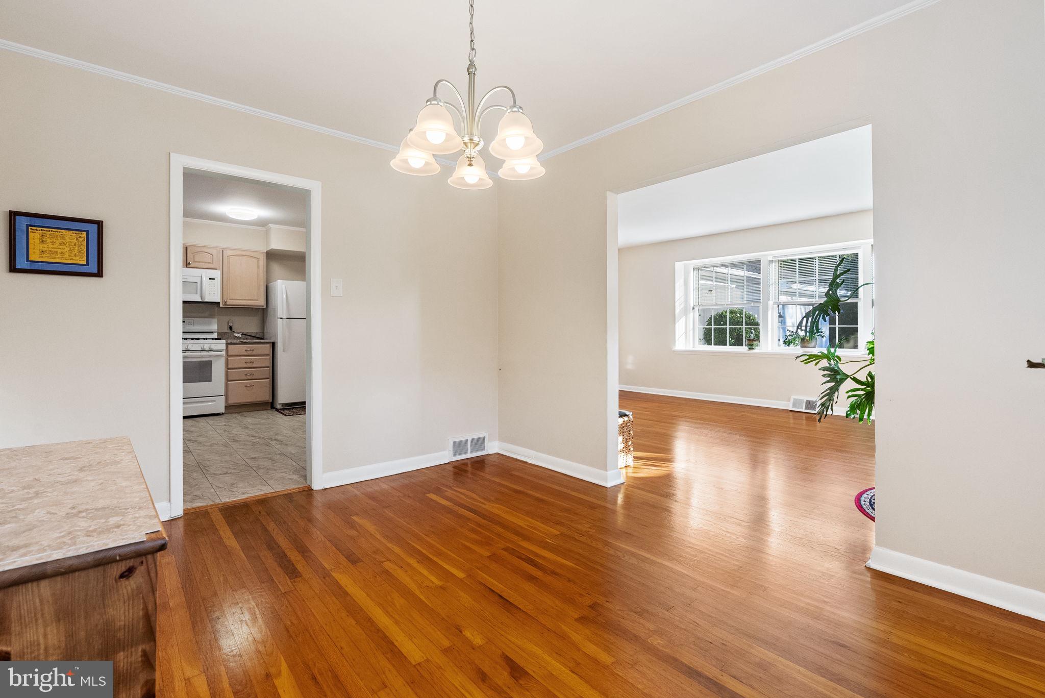 391 Rittenhouse Boulevard Eagleville, PA 19403 - Photo 9 of 43 a view of livingroom with kitchen and hardwood