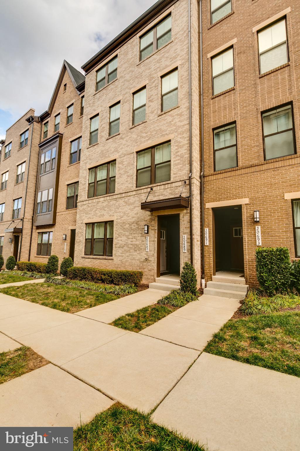 20687 Heron Landing Drive Sterling, VA 20166 - Photo 2 of 39 Modern brick facade with inviting pathways.