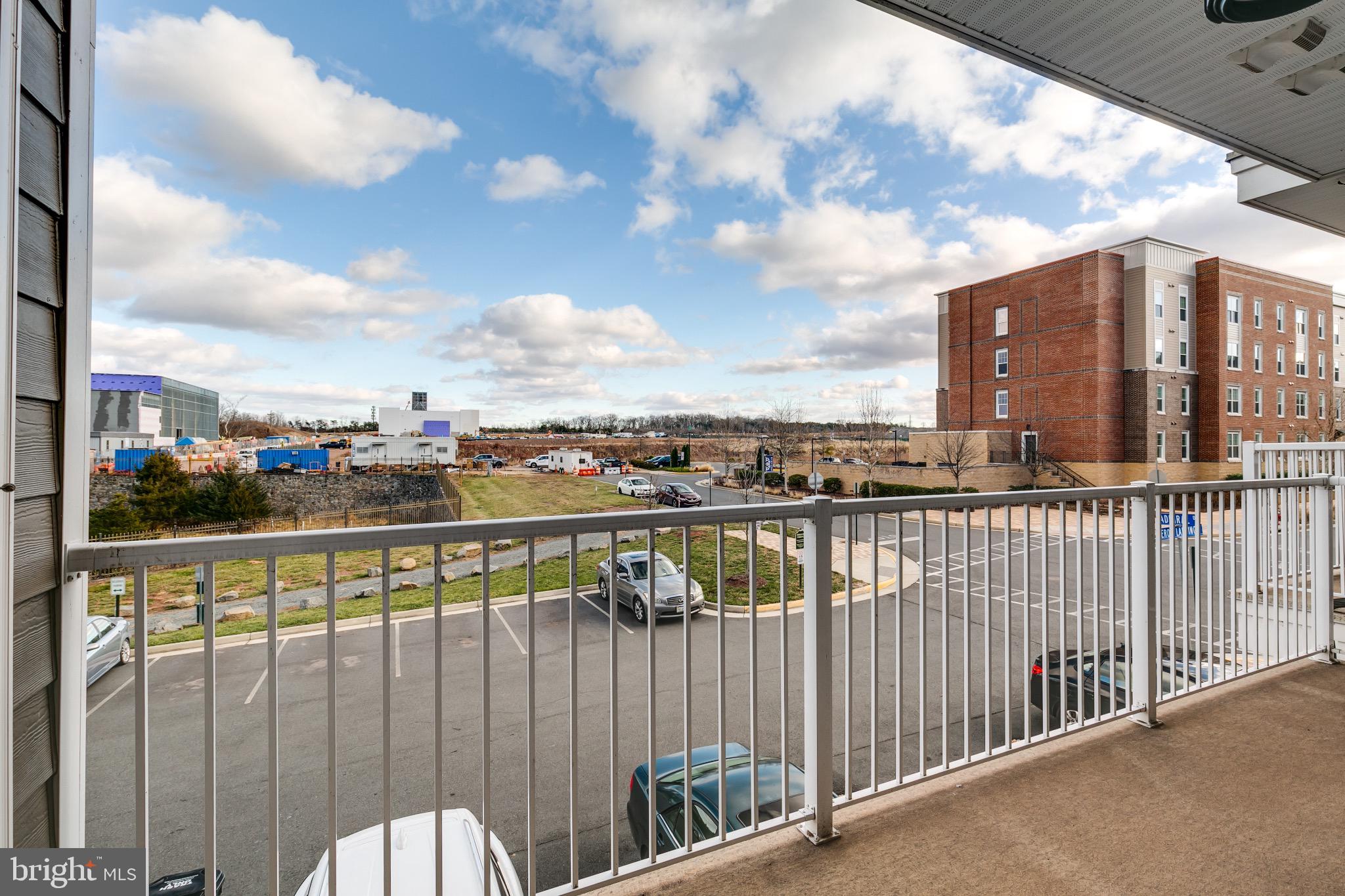 20687 Heron Landing Drive Sterling, VA 20166 - Photo 26 of 39 Sunny balcony view with open skies.