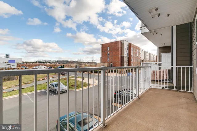 a view of a balcony with city view