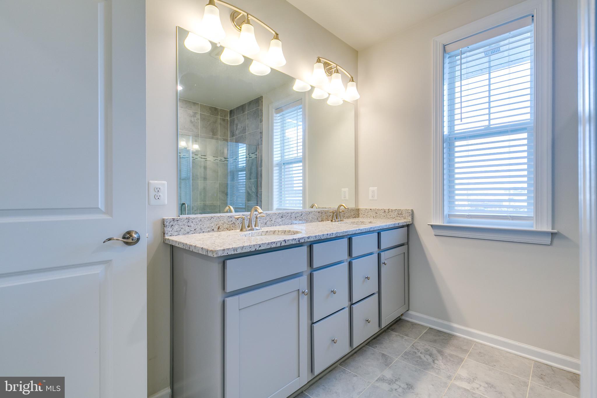 20687 Heron Landing Drive Sterling, VA 20166 - Photo 29 of 39 Bright and airy modern bathroom retreat.