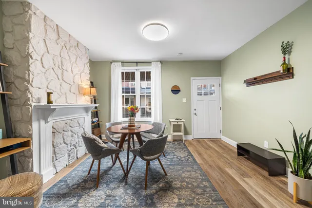 a view of a dining room with furniture and window