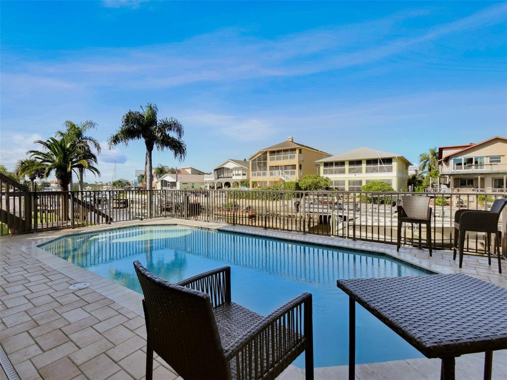 6241 Bayside Drive New Port Richey, FL 34652 - Photo 18 of 78 a view of a roof deck with chair and table