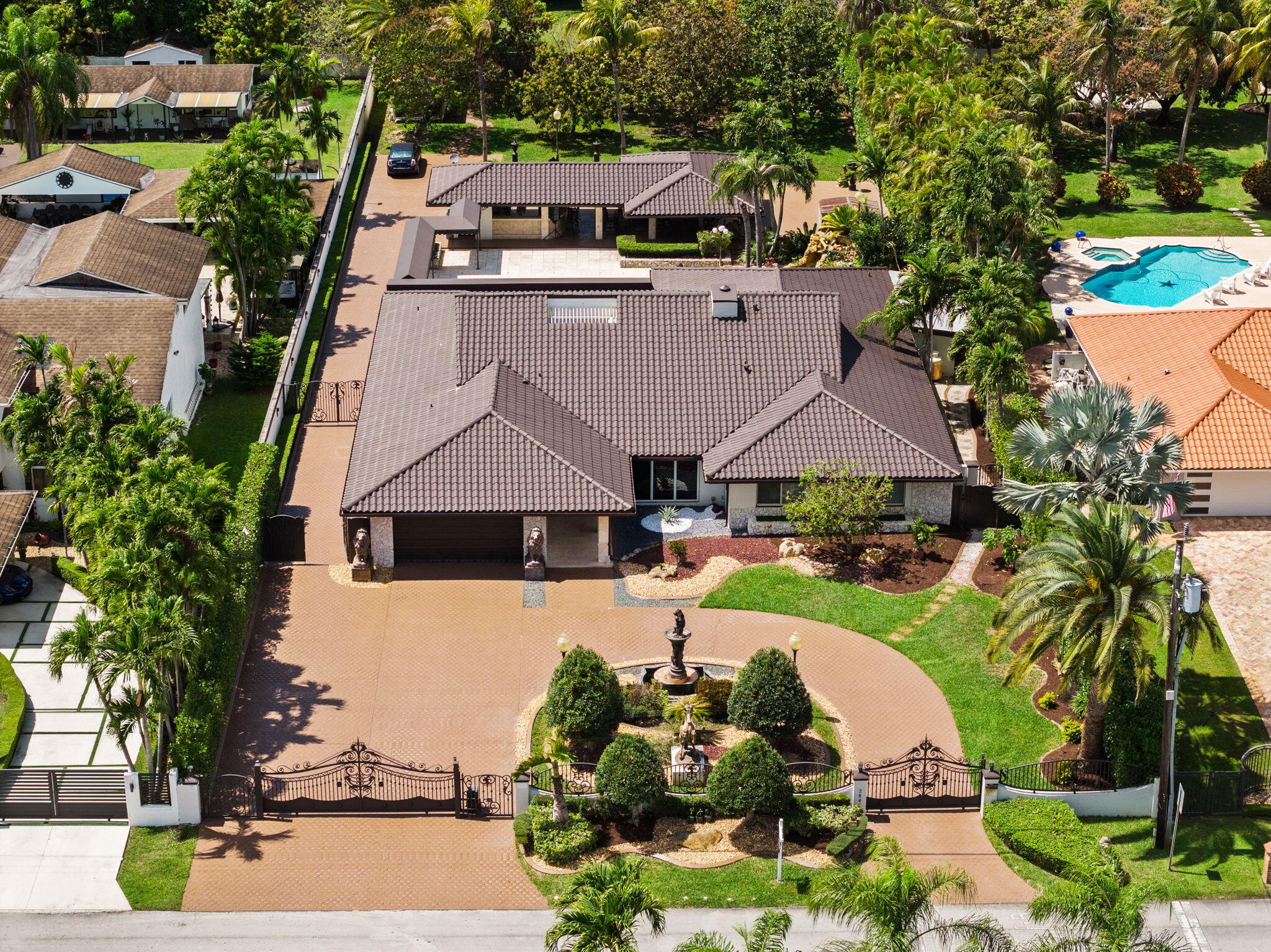 2840 Southwest 128th Avenue Miami, FL 33175 - Photo 1 of 46 an aerial view of a house with yard swimming pool and outdoor seating