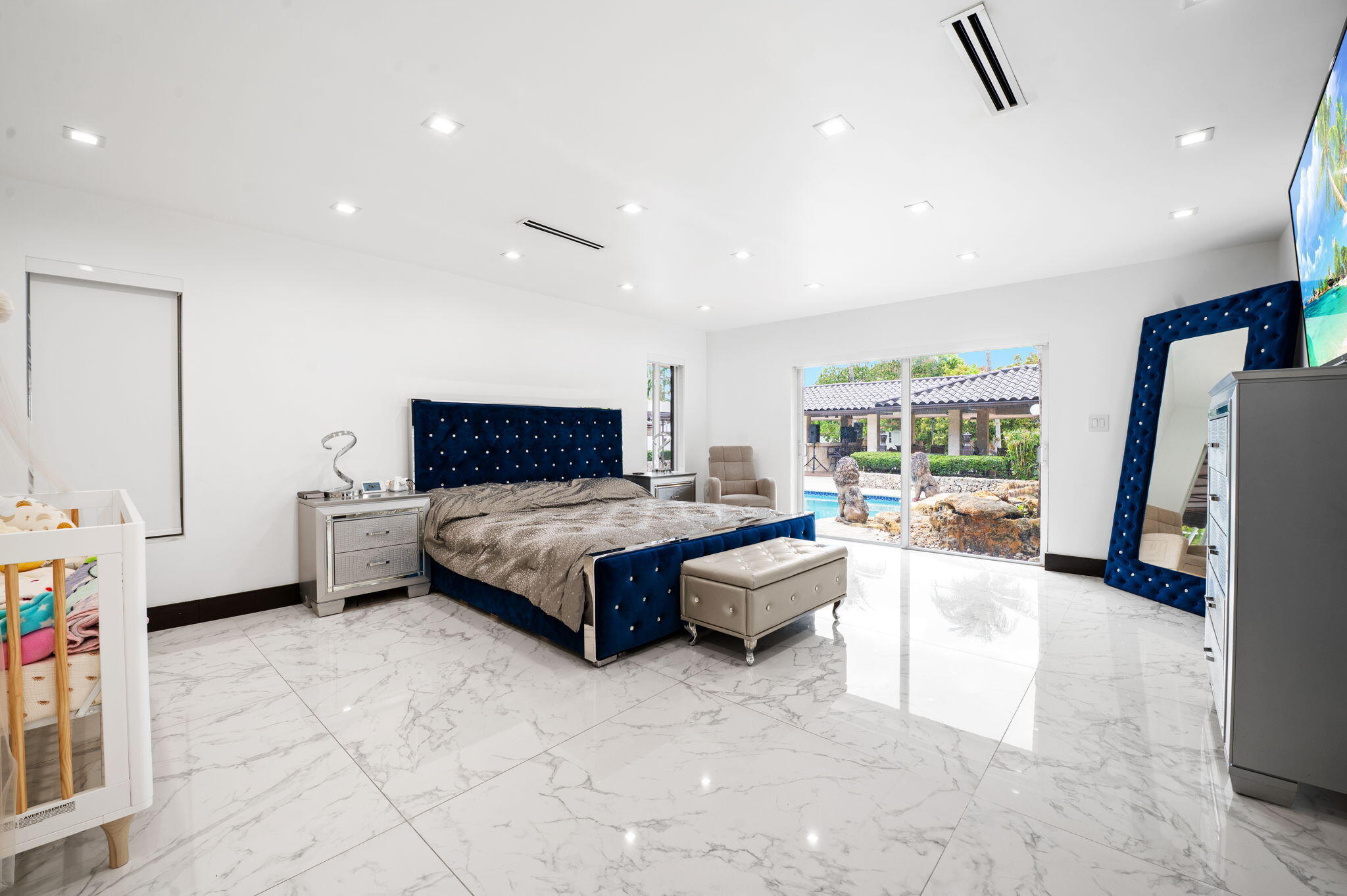 2840 Southwest 128th Avenue Miami, FL 33175 - Photo 17 of 46 a bedroom with furniture and a large window
