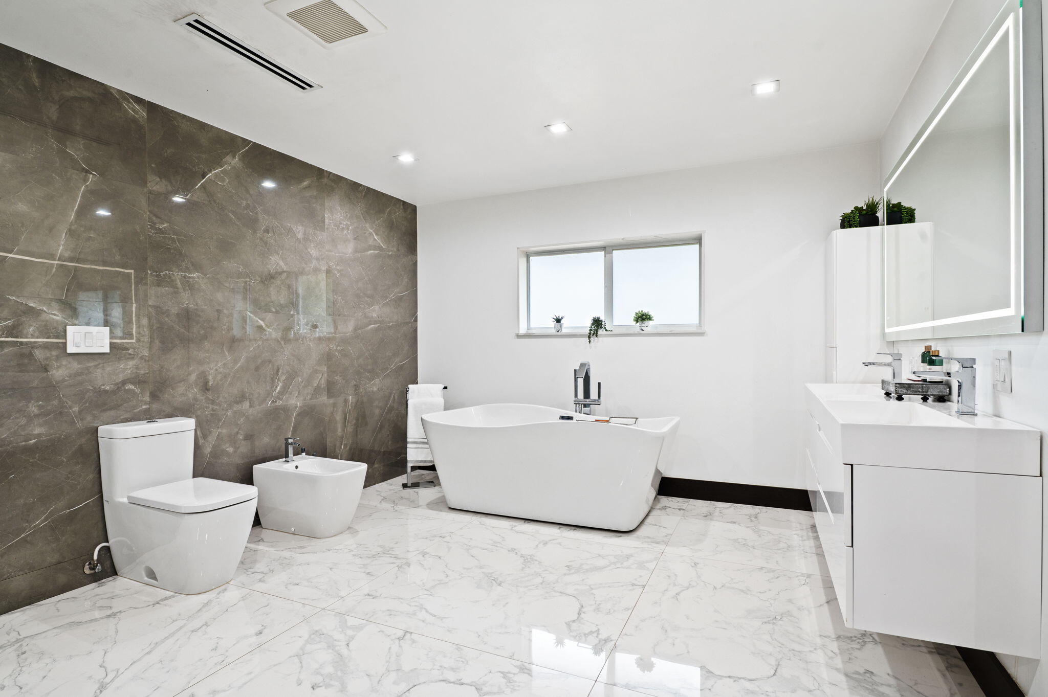 2840 Southwest 128th Avenue Miami, FL 33175 - Photo 19 of 46 a white bath tub sitting next to a white toilet