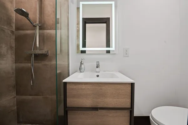 a bedroom with a bed and a closet