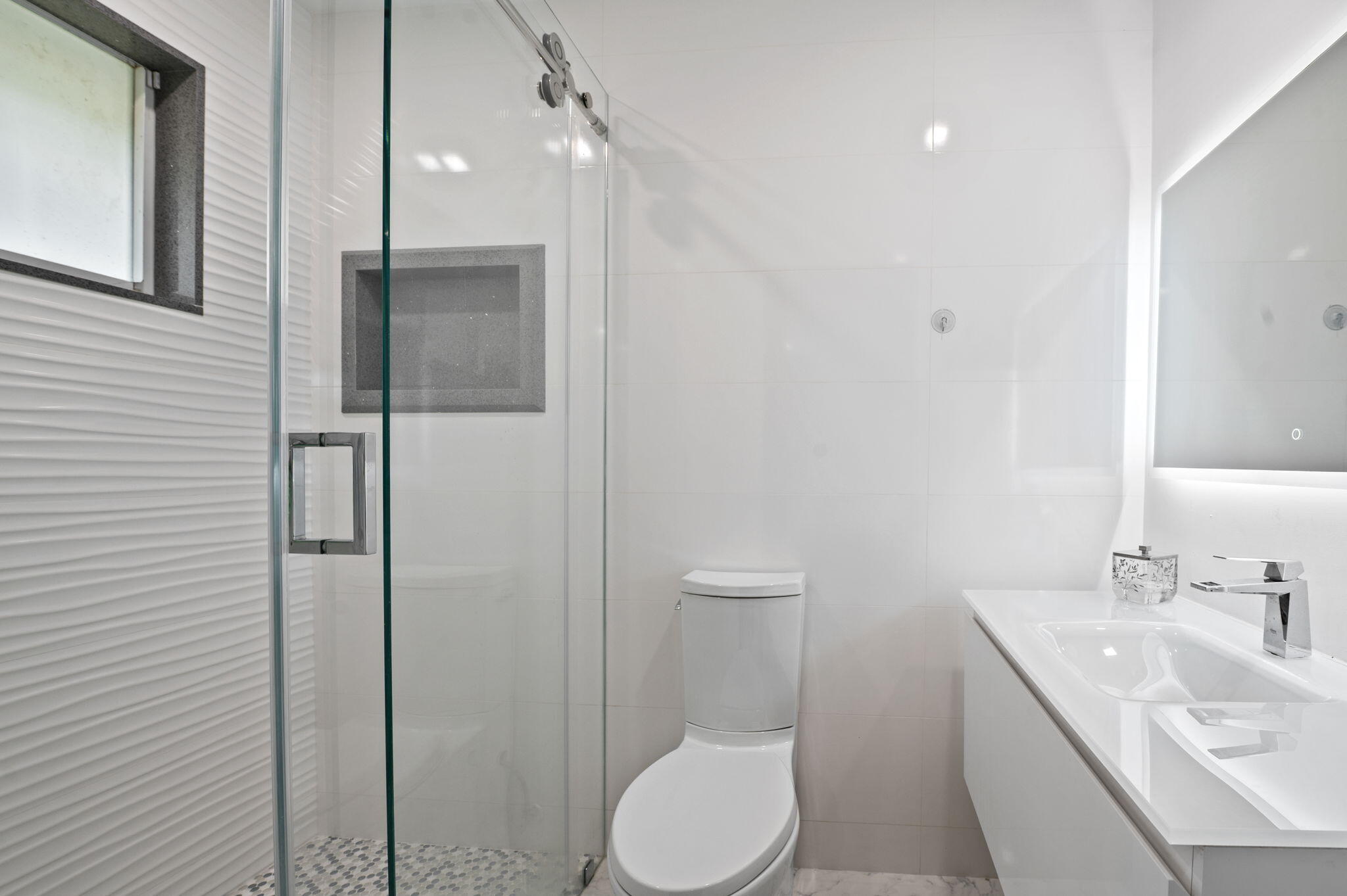 2840 Southwest 128th Avenue Miami, FL 33175 - Photo 30 of 46 a bathroom with a toilet a sink and mirror