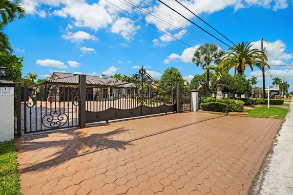 a view of a garden with a pathway