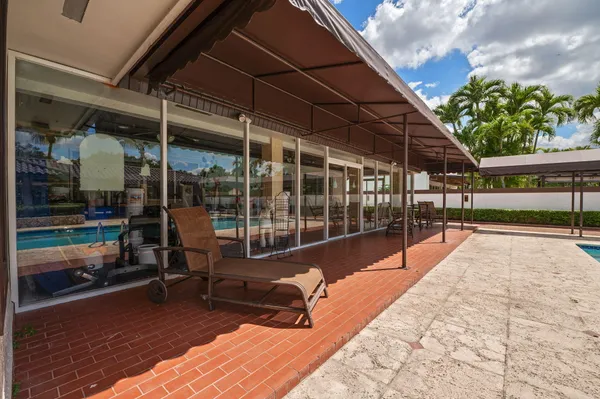 a view of a house with swimming pool