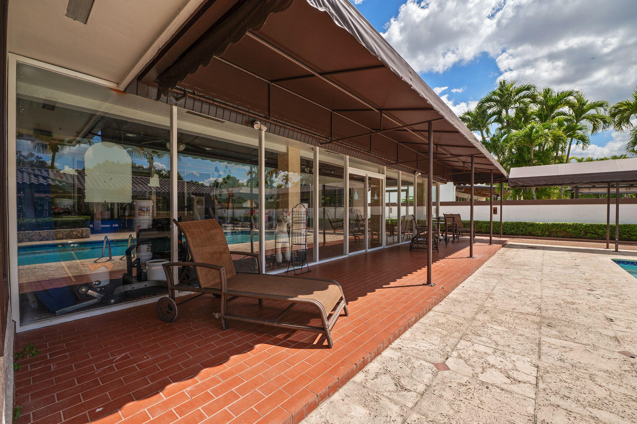 2840 Southwest 128th Avenue Miami, FL 33175 - Photo 33 of 46 a view of a chairs and table in the balcony