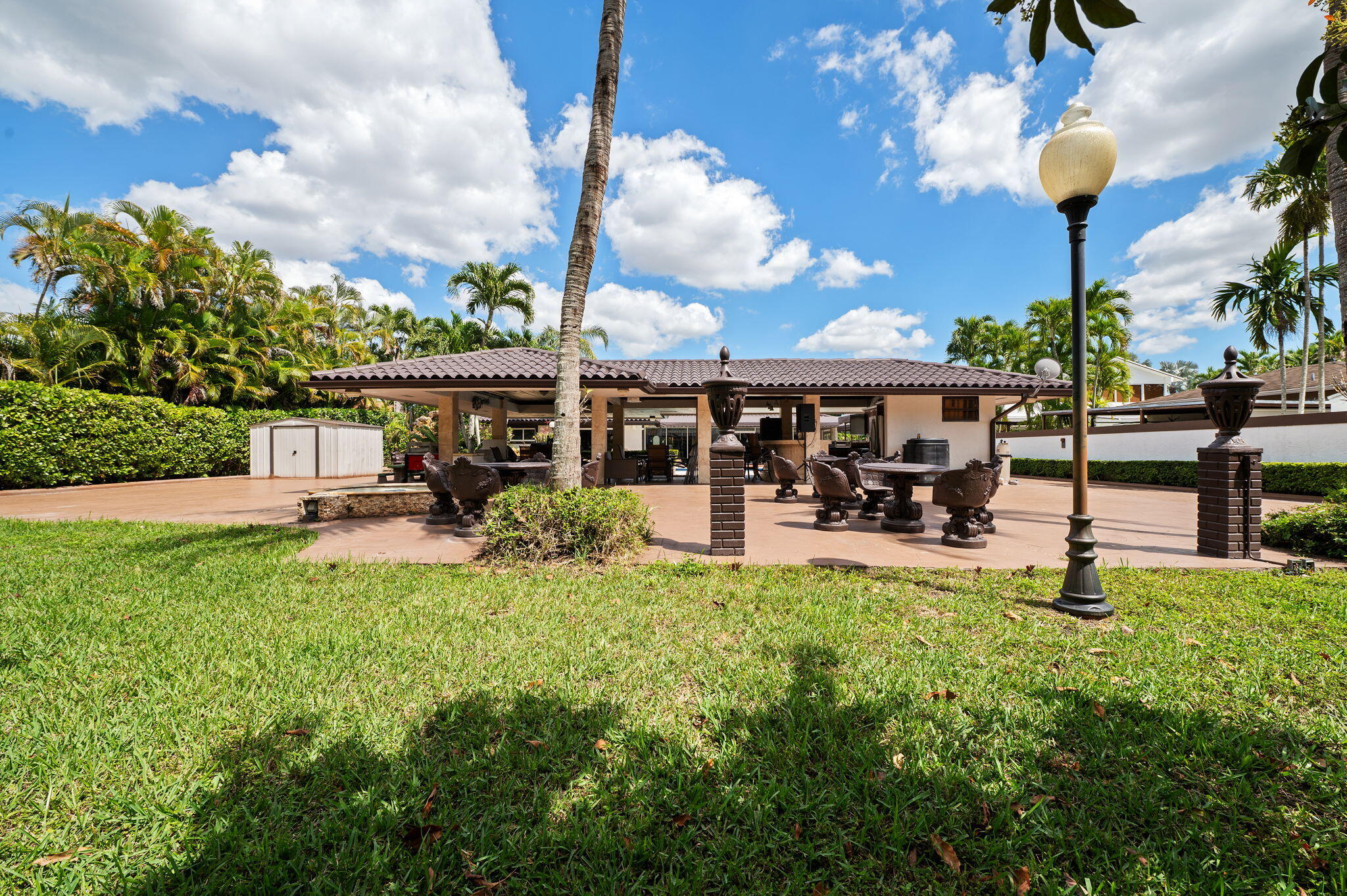 2840 Southwest 128th Avenue Miami, FL 33175 - Photo 42 of 46 a view of a house with sitting area and a yard
