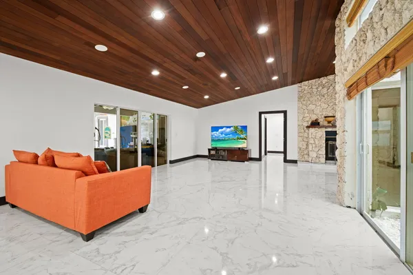 a lobby with furniture and window