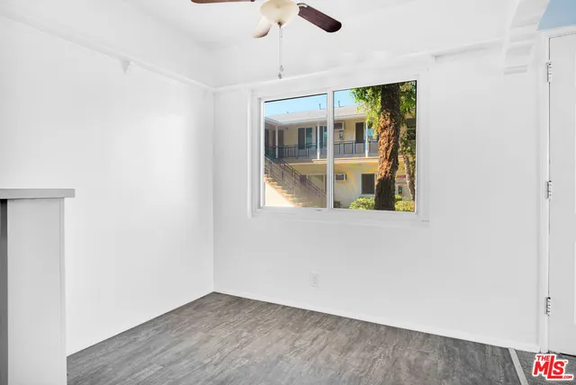 an empty room with window