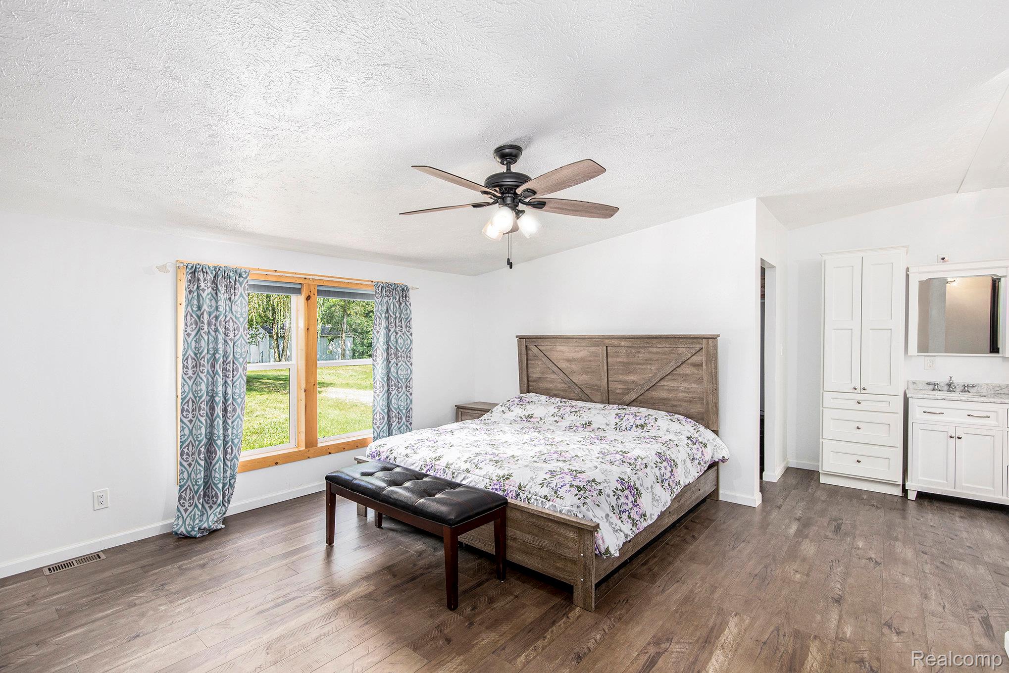 3765 West Burnside Road Columbiaville, MI 48421 - Photo 10 of 28 Primary Bedroom Suite
