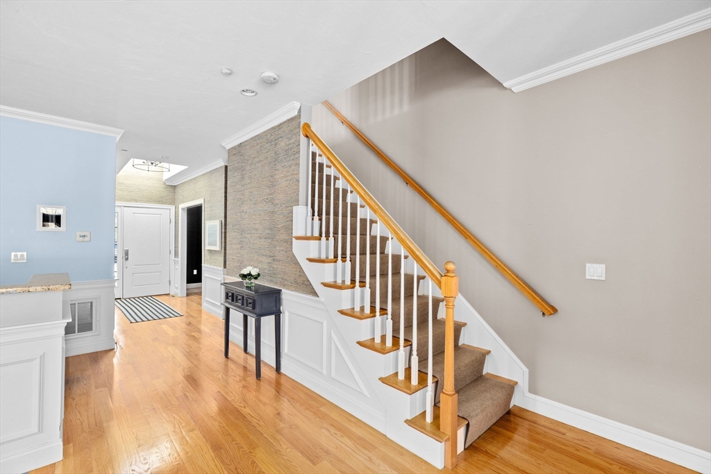 239 Washington Street, Unit 9 Norwell, MA 02061 - Photo 20 of 27 a view of entryway and hall with wooden floor