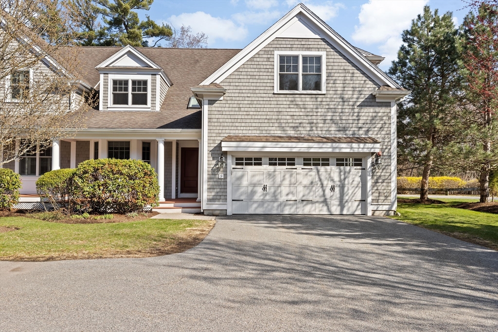 239 Washington Street, Unit 9 Norwell, MA 02061 - Photo 26 of 27 a front view of a house with a yard