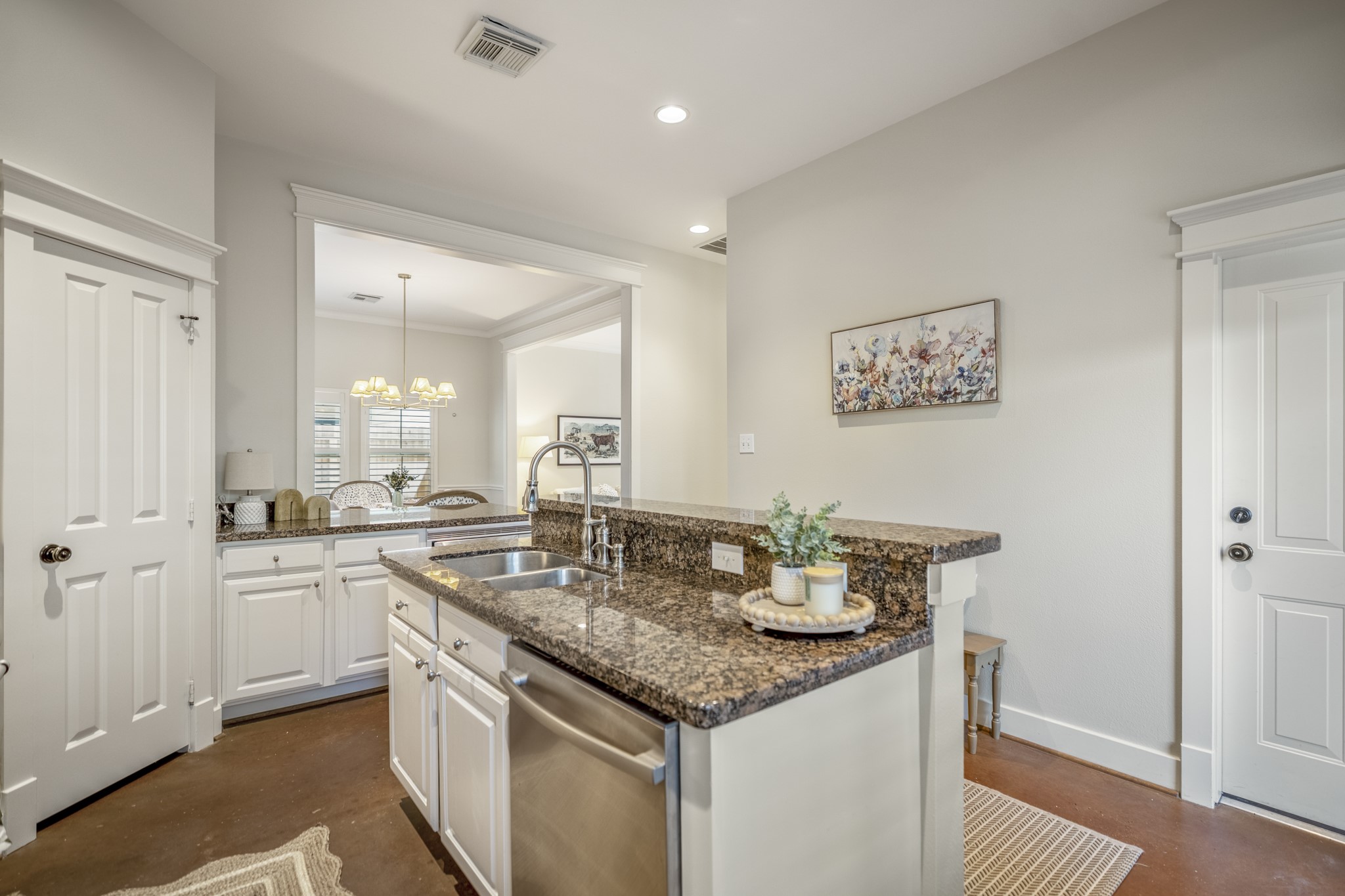 905 West 23rd Street Houston, TX 77008 - Photo 10 of 46 Kitchen features stainless steel appliances, breakfast bar seating, and convenient access to the dining area.