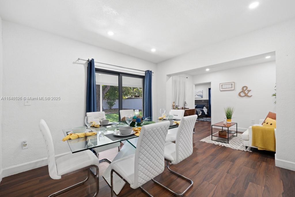 445 Southwest 62nd Court Miami, FL 33144 - Photo 13 of 41 a living room with furniture and wooden floor