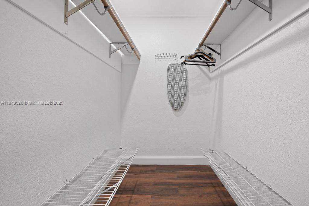 445 Southwest 62nd Court Miami, FL 33144 - Photo 17 of 41 a view of a room with racks on the wall