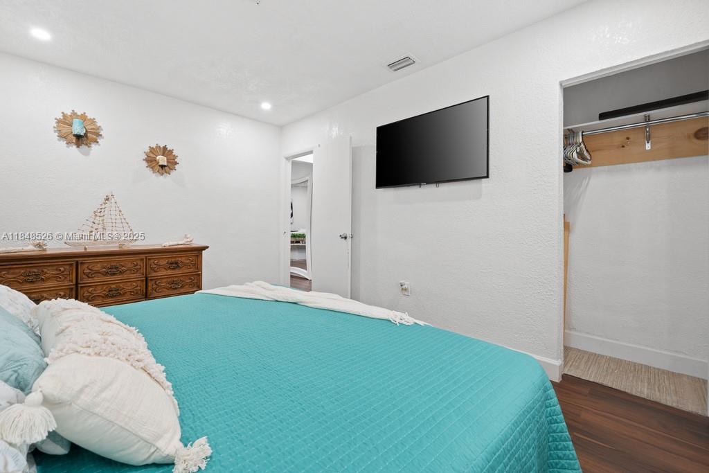 445 Southwest 62nd Court Miami, FL 33144 - Photo 22 of 41 a living room with furniture and a flat screen tv