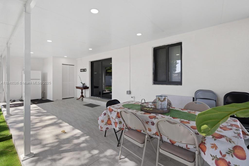 445 Southwest 62nd Court Miami, FL 33144 - Photo 38 of 41 a very nice looking dining room with a table and chairs
