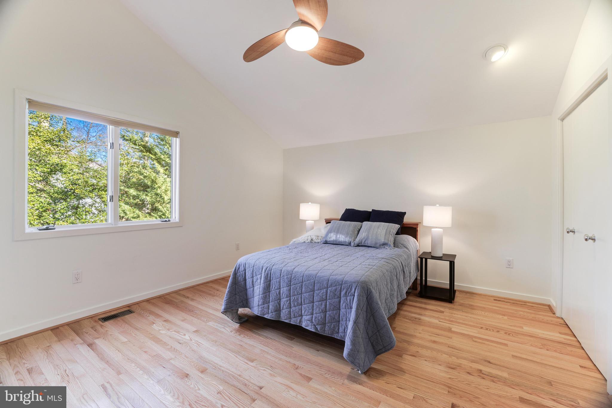 11409 Fieldstone Lane Reston, VA 20191 - Photo 54 of 63 a bedroom with a bed and a window