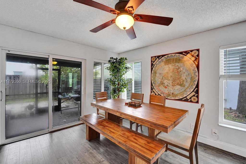 2747 Pinewood Court Davie, FL 33328 - Photo 13 of 25 a view of a dining room with furniture window and outside view