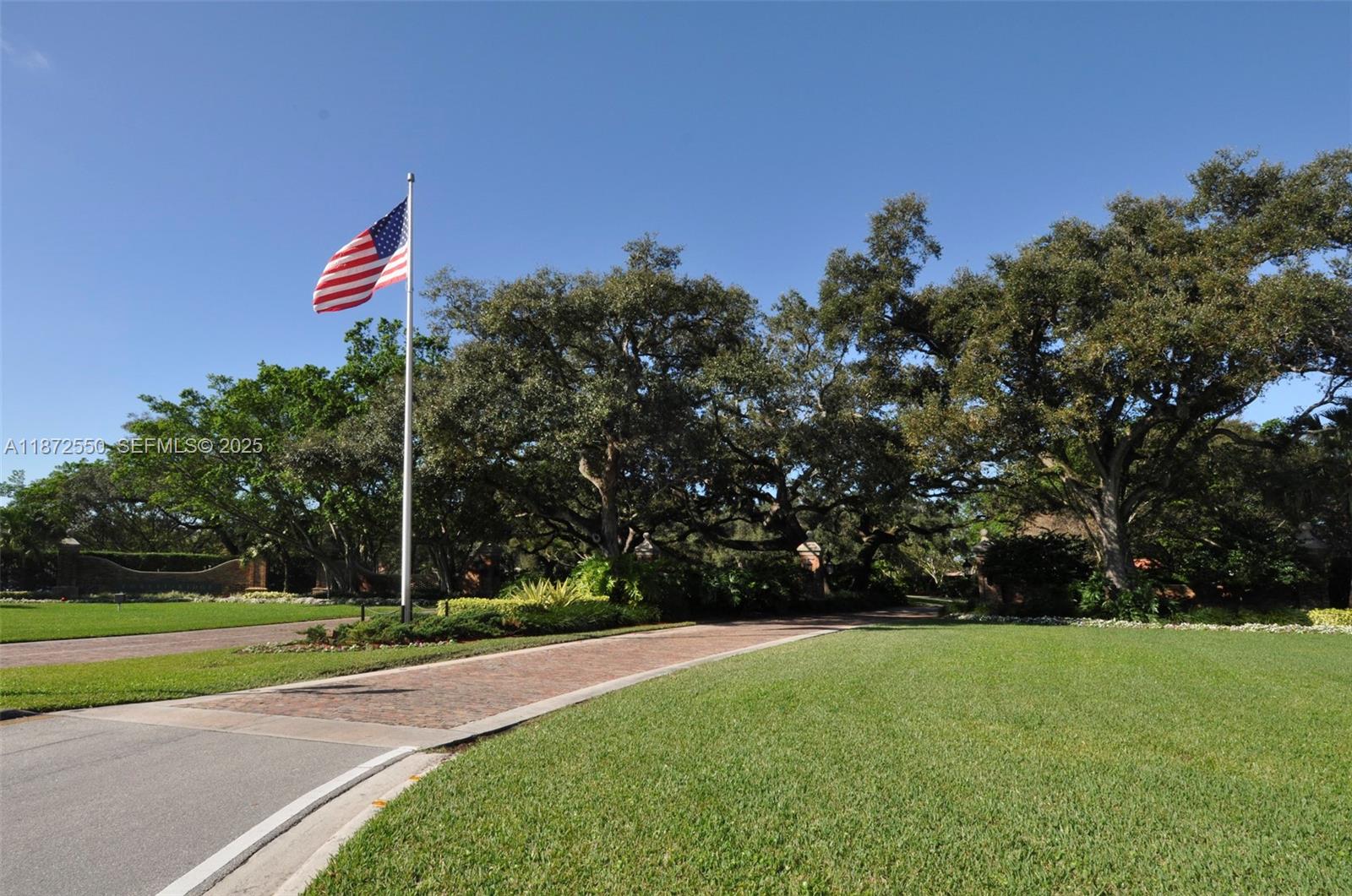 2747 Pinewood Court Davie, FL 33328 - Photo 23 of 25 a front view of a house with a yard