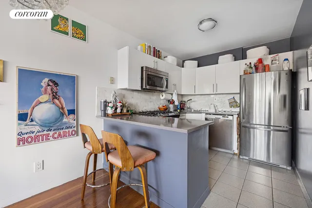 a living room with furniture a flat screen tv and a large window
