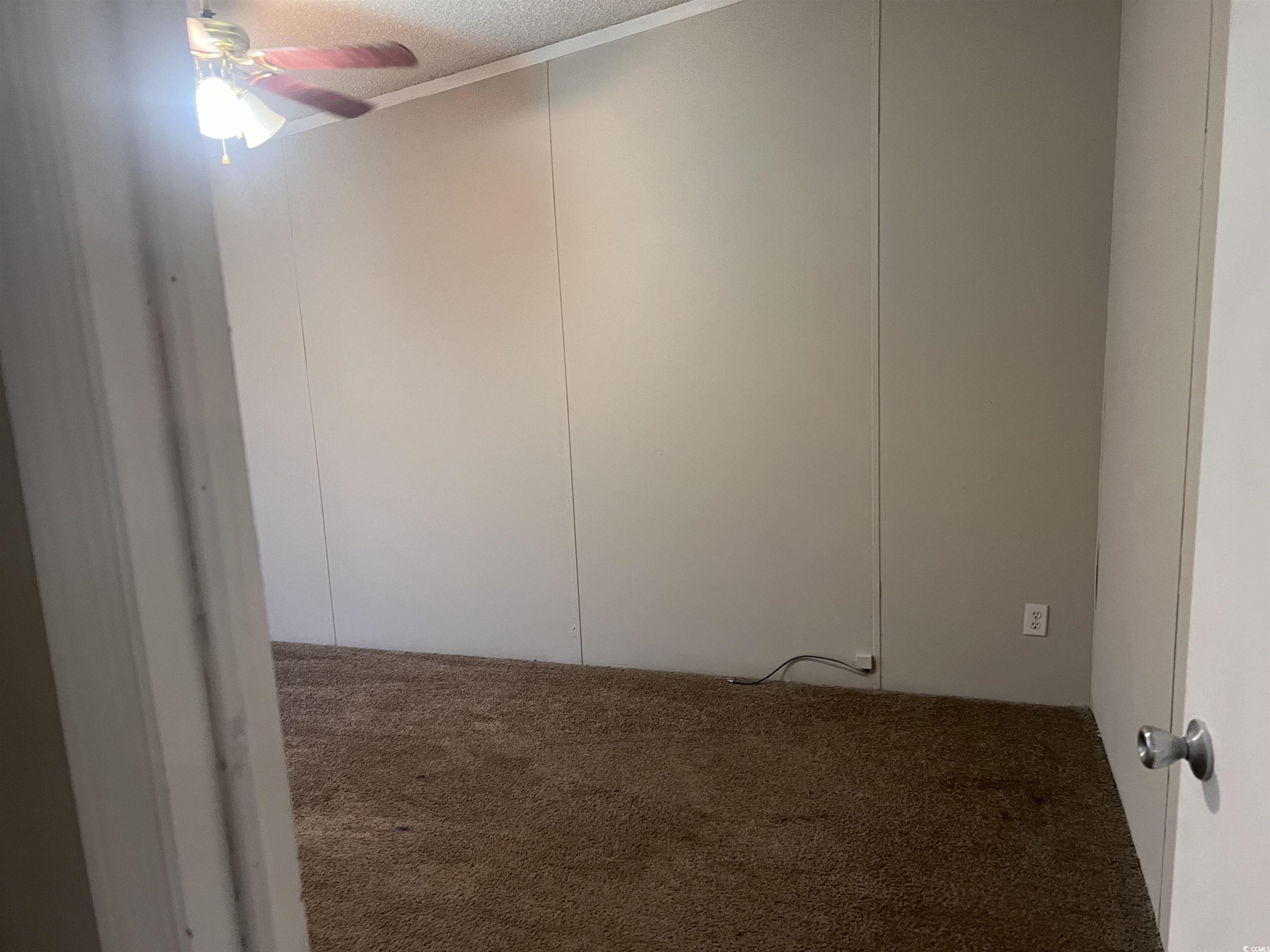 159 Jeffcoat Bridge Road North, SC 29112 - Photo 17 of 17 Carpeted spare room featuring ceiling fan and a te