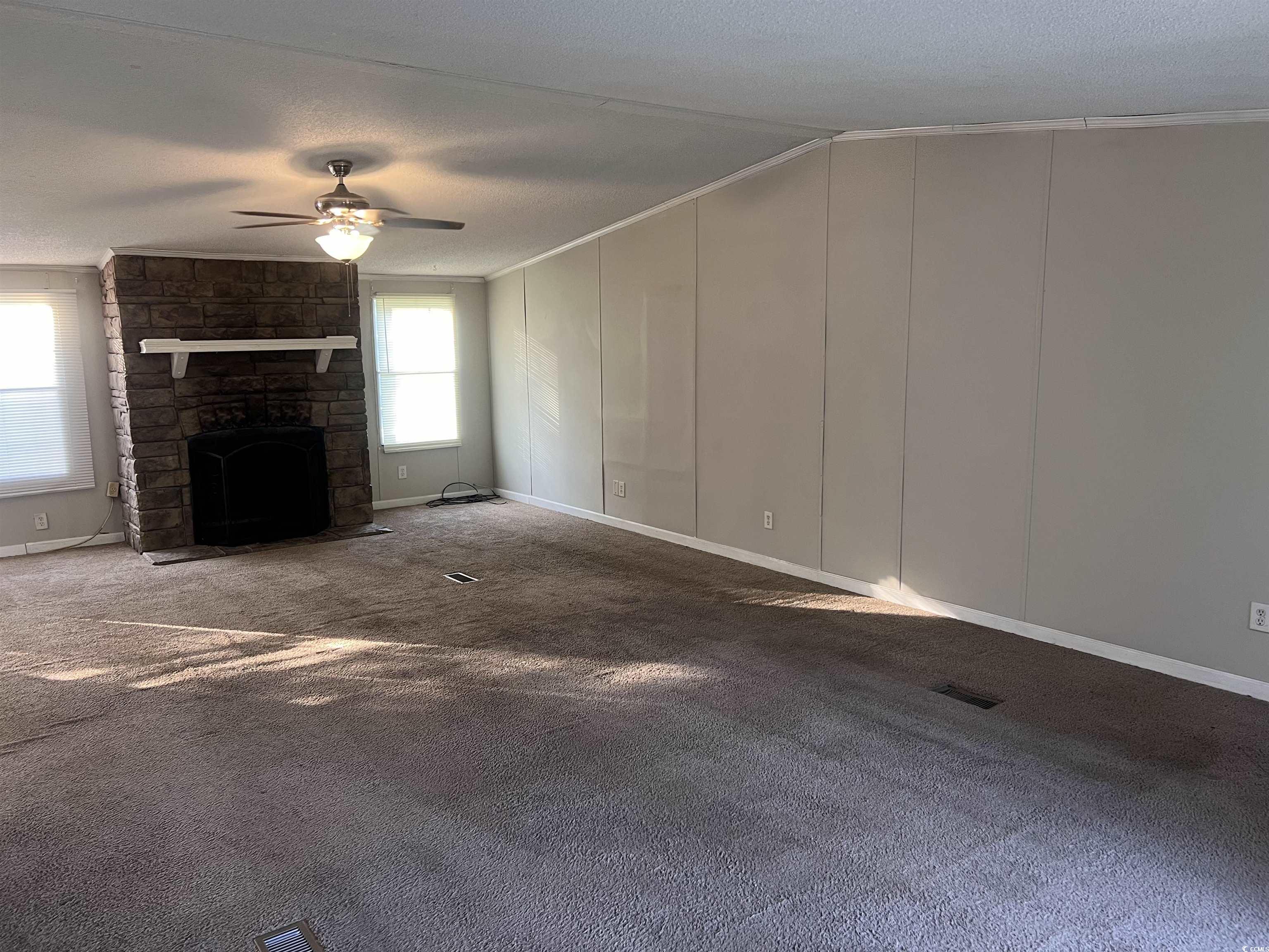 159 Jeffcoat Bridge Road North, SC 29112 - Photo 5 of 17 Unfurnished living room with crown molding, ceilin