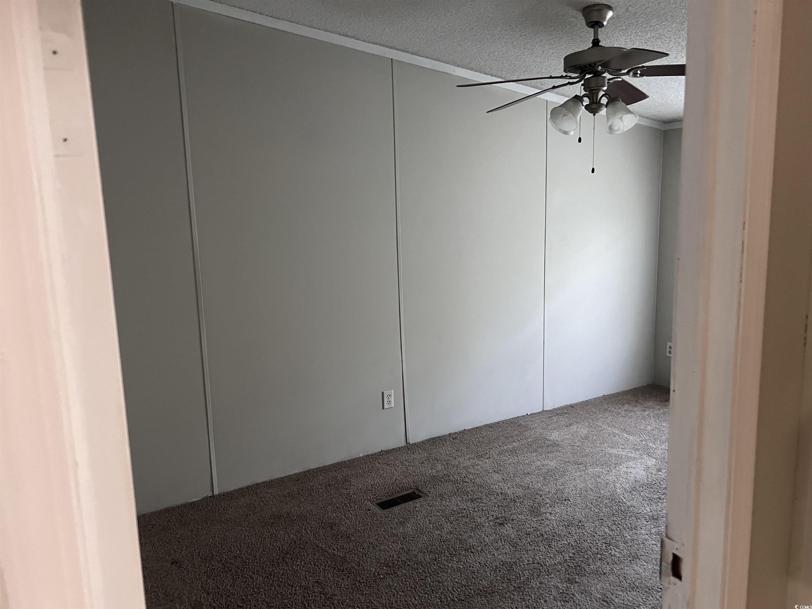 159 Jeffcoat Bridge Road North, SC 29112 - Photo 8 of 17 Carpeted spare room featuring a textured ceiling a