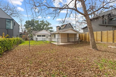 a house with trees in front of it