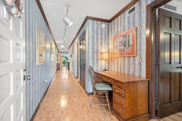 a view of an entryway wooden floor and stairs