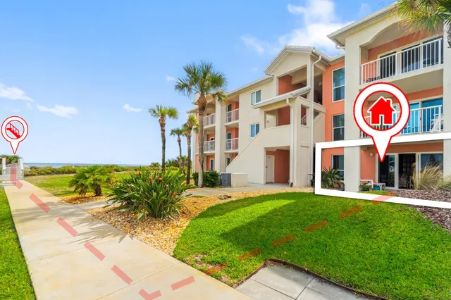 a view of a swimming pool with outdoor seating
