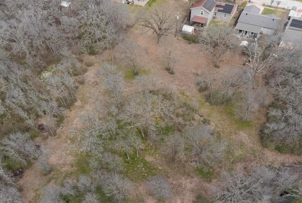 3800 Pioneer Road Balch Springs, TX 75180 - Photo 11 of 17 a view of a dry yard with green space
