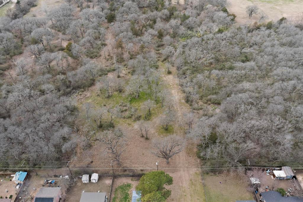 3800 Pioneer Road Balch Springs, TX 75180 - Photo 15 of 17 a view of a field with trees in background