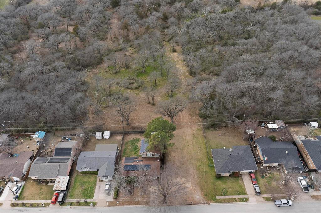 3800 Pioneer Road Balch Springs, TX 75180 - Photo 16 of 17 an aerial view of residential house with outdoor space