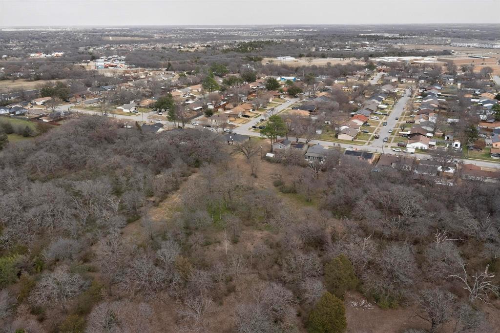 3800 Pioneer Road Balch Springs, TX 75180 - Photo 3 of 17 an aerial view of town with residential houses and trees