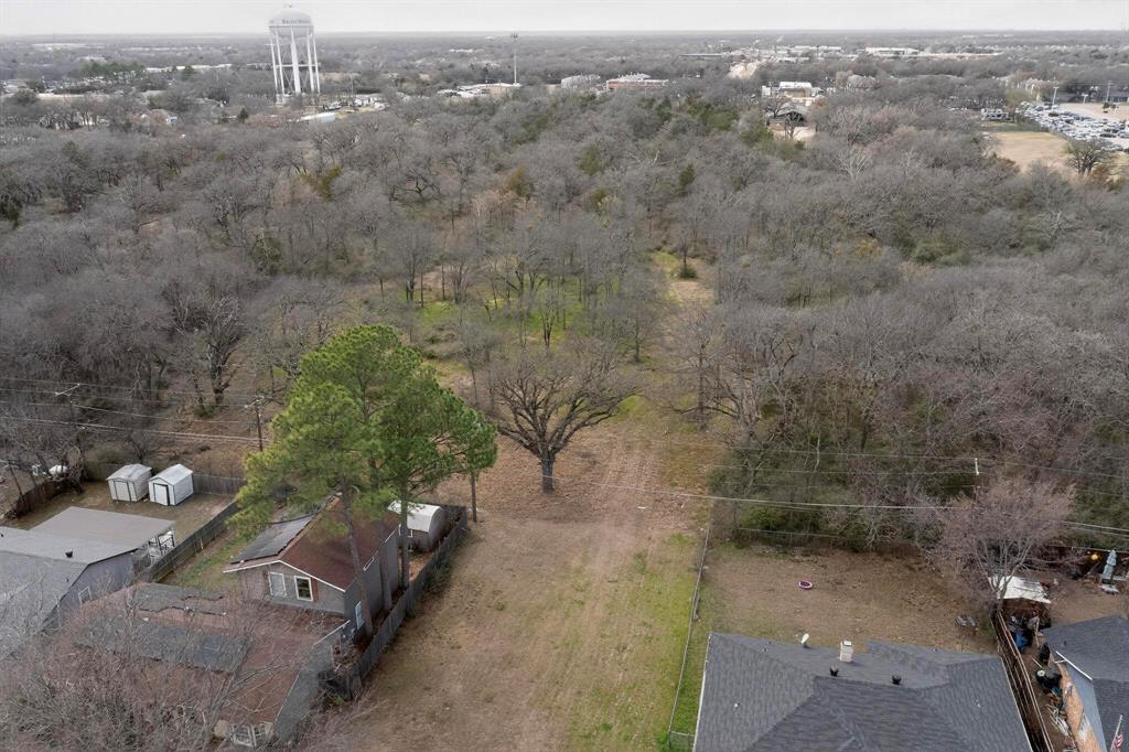 3800 Pioneer Road Balch Springs, TX 75180 - Photo 10 of 17 an aerial view of a house with a yard