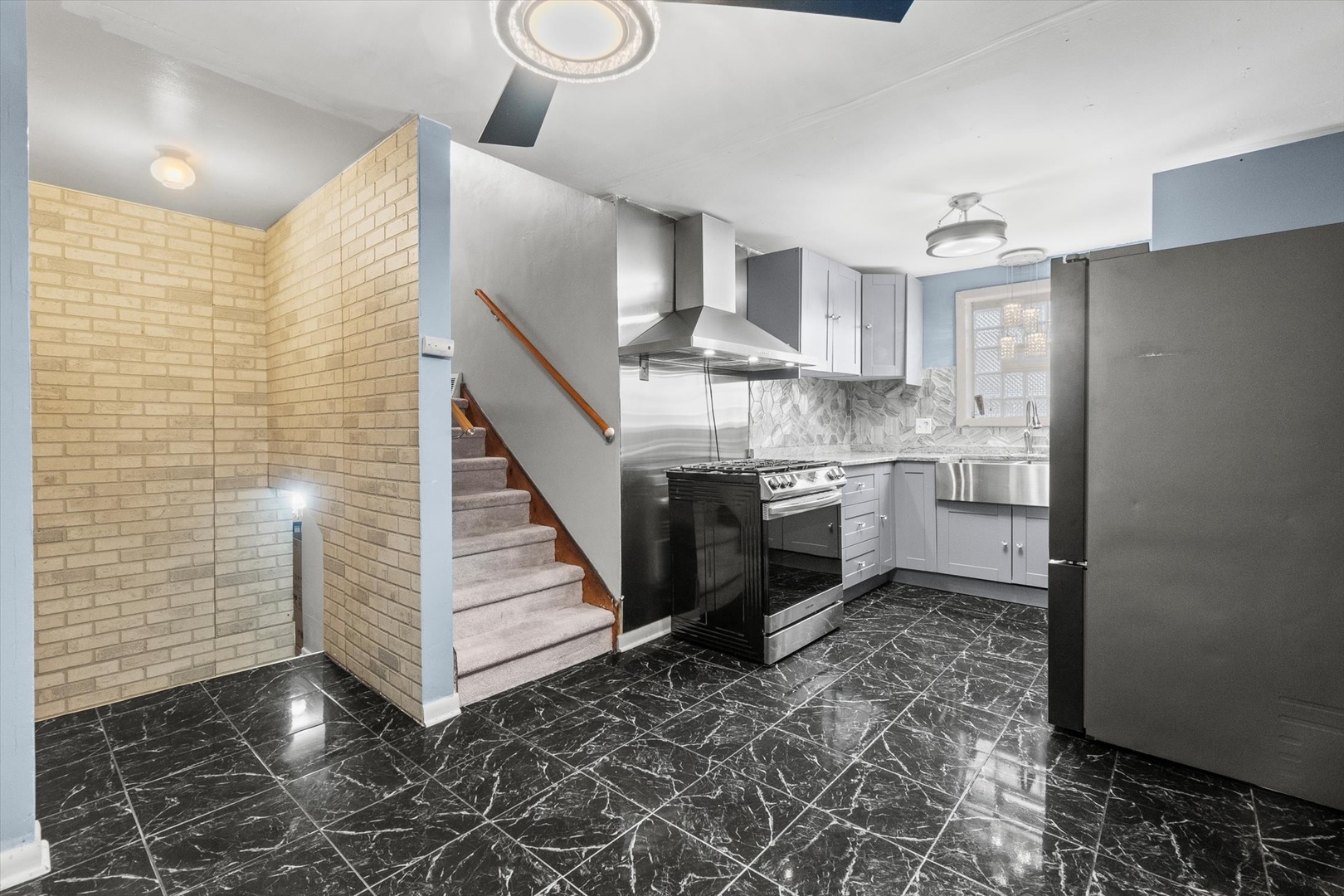 11417 South Church Street Chicago, IL 60643 - Photo 18 of 24 a kitchen with kitchen island a sink stainless steel appliances and cabinets
