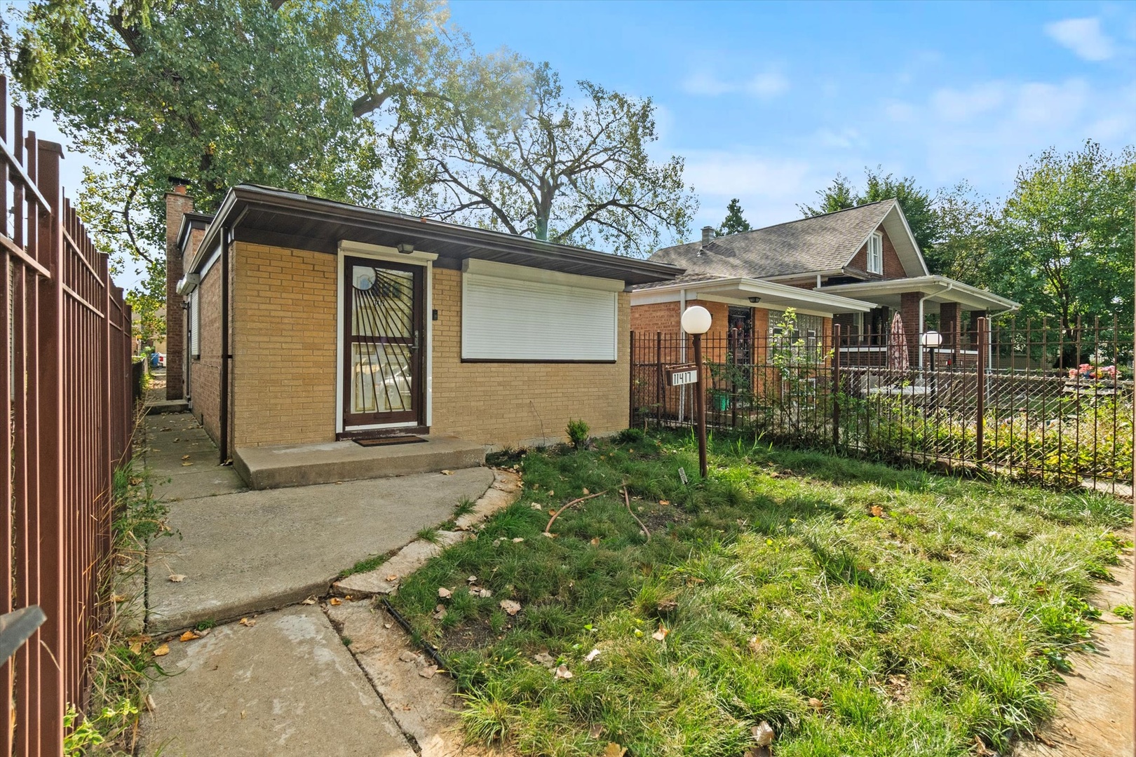 11417 South Church Street Chicago, IL 60643 - Photo 2 of 24 front view of a house with a yard