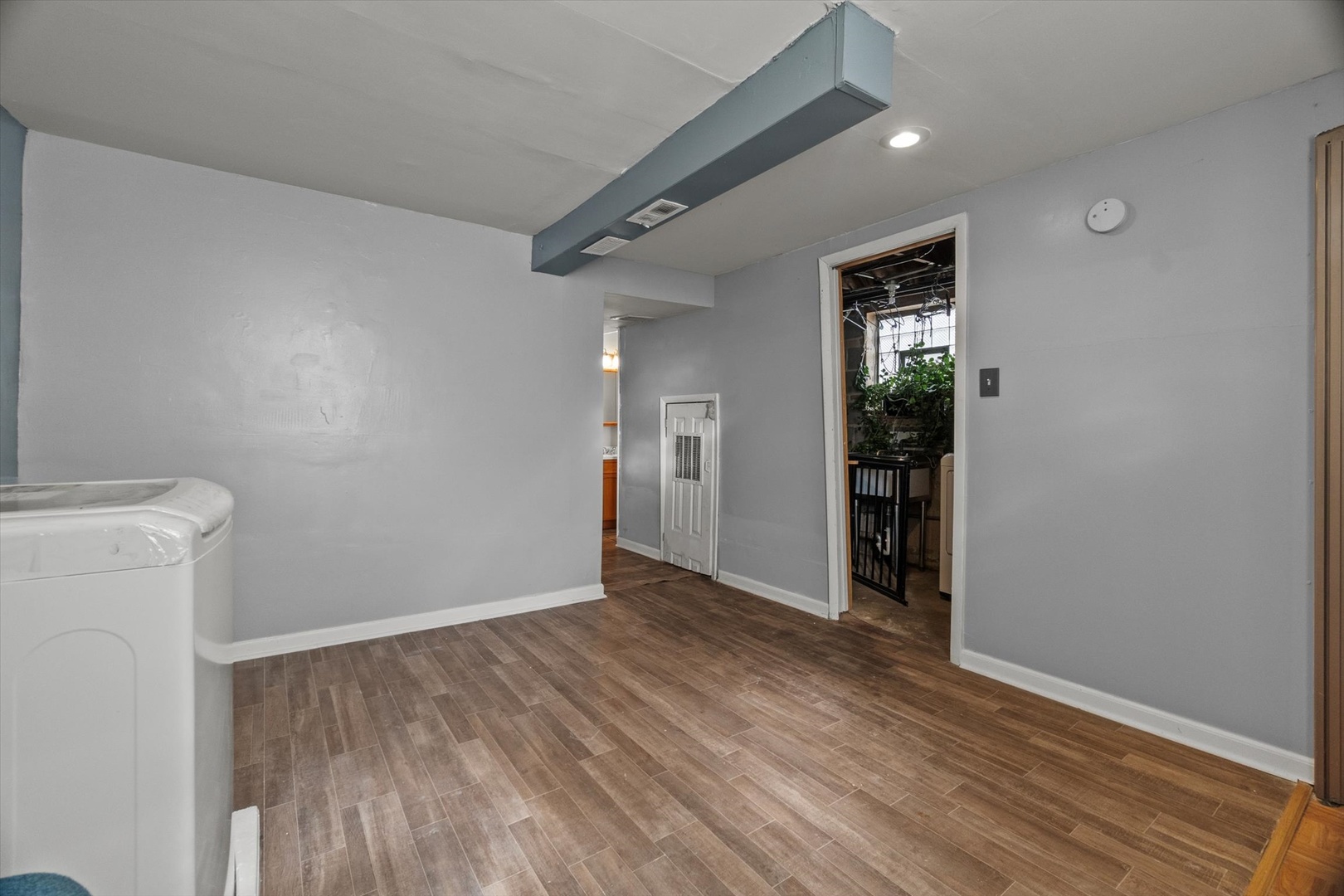 11417 South Church Street Chicago, IL 60643 - Photo 5 of 24 a view of an empty room with wooden floor and a window