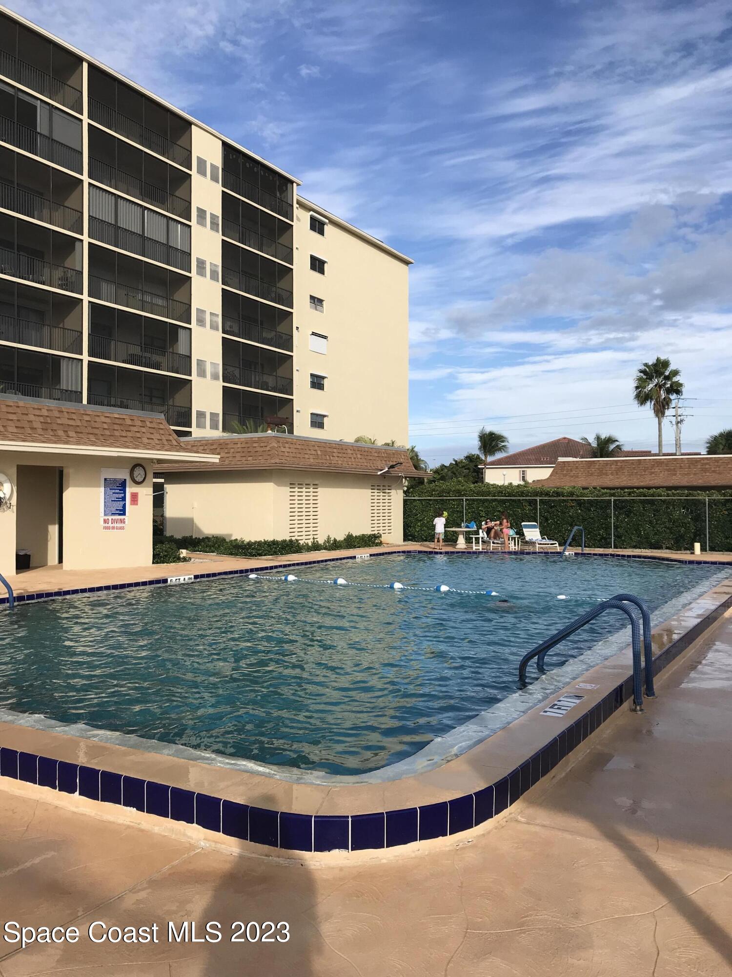 416 School Road, Unit 204 Indian Harbour Beach, FL 32937 - Photo 2 of 14 a view of swimming pool