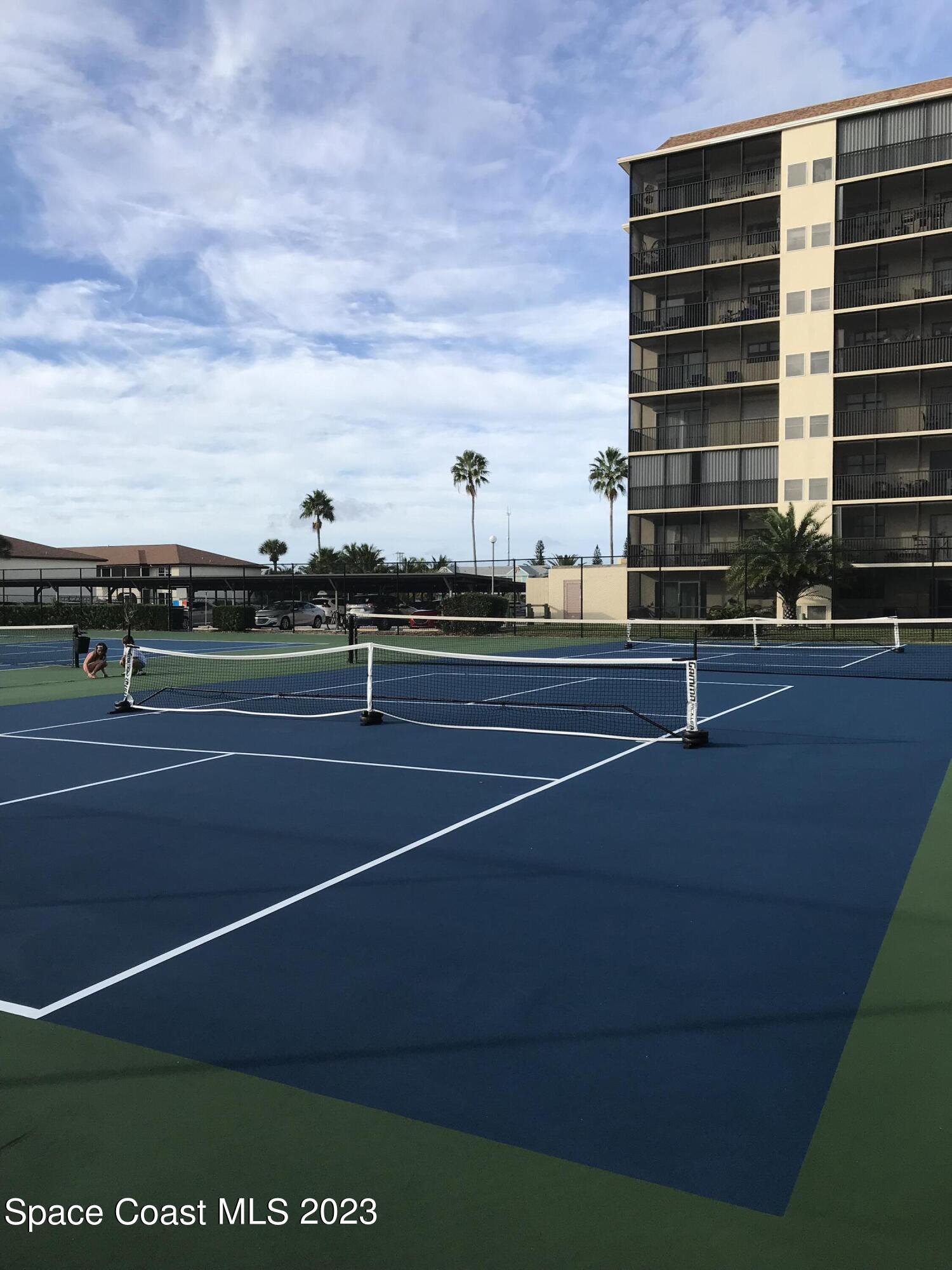 416 School Road, Unit 204 Indian Harbour Beach, FL 32937 - Photo 3 of 14 a view of tennis court