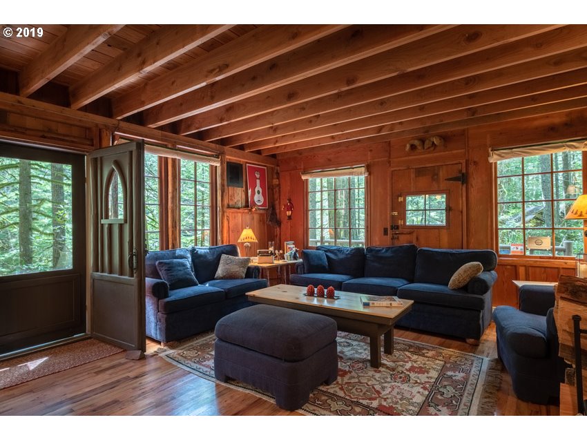 79546 Road 35 A Rhododendron, OR 97049 - Photo 7 of 30 a living room with furniture and a large window