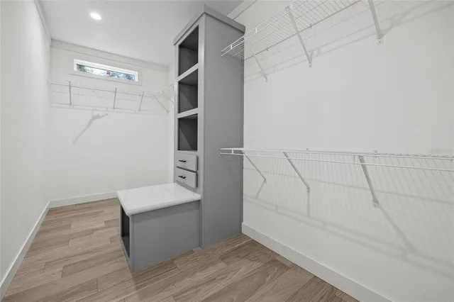 a view of an empty walk in closet